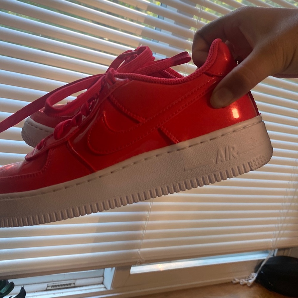 Neon red Nike Air Force ones